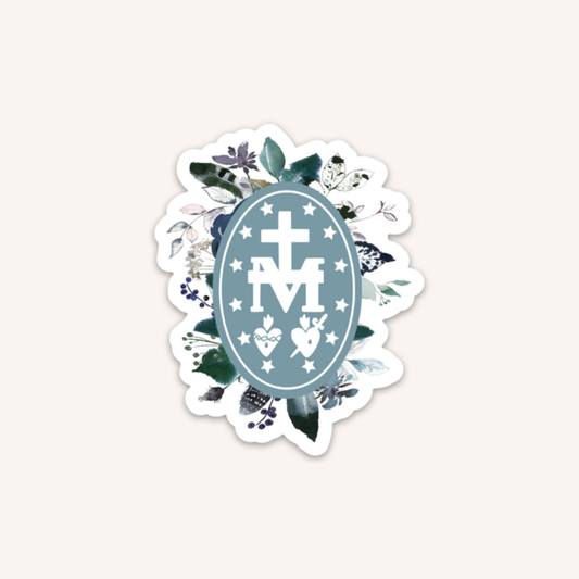a sticker with a cross and flowers on it