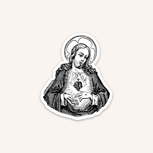 a sticker of the virgin mary holding a baby jesus