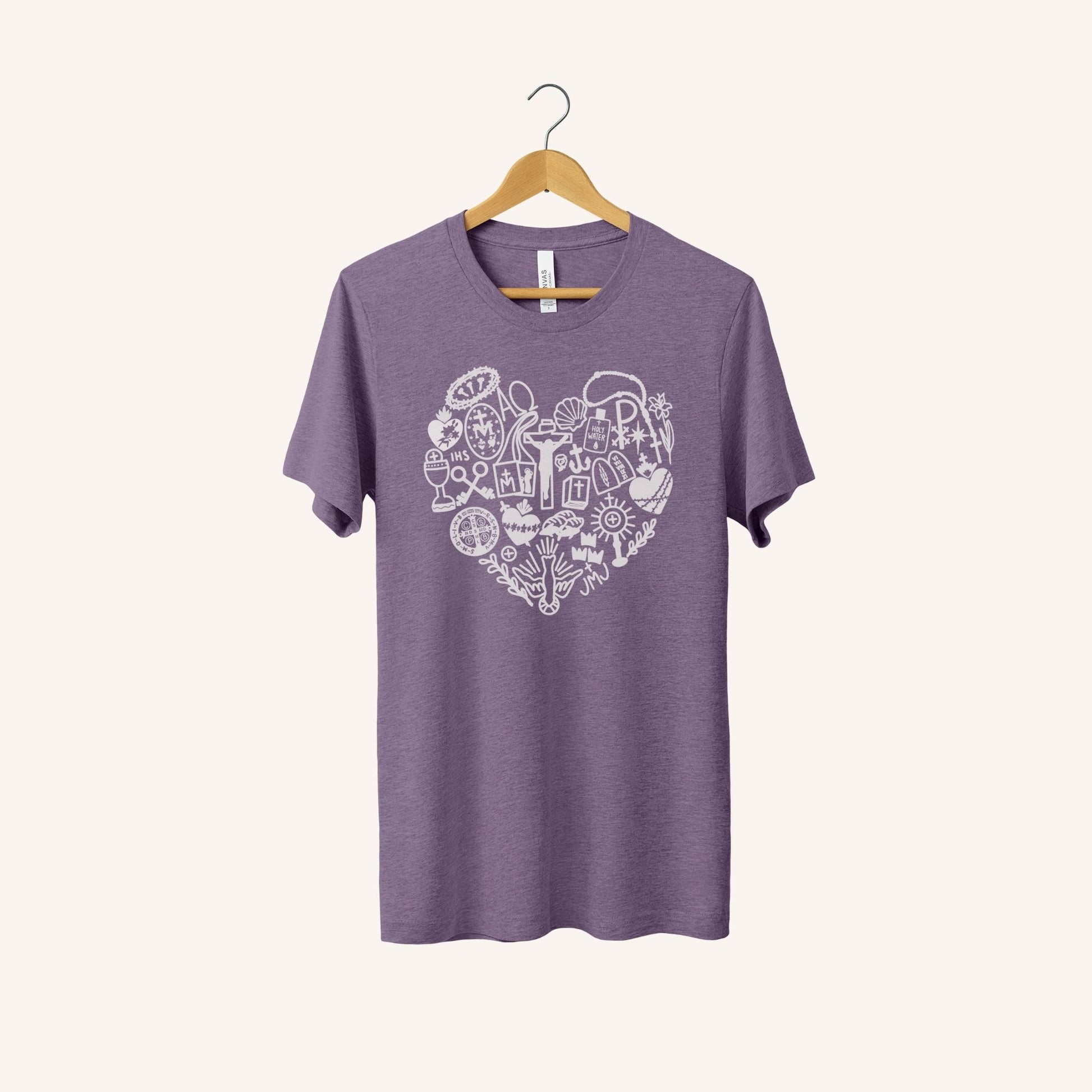 a purple t - shirt with a white heart on it
